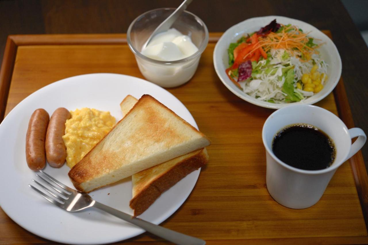 Guesthouse Iwase Toyama Station Buitenkant foto